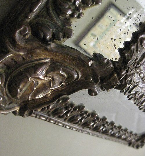 antique cushion mirror